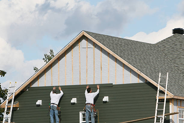 Professional Siding Replacement technician working in Queen Anne, MD